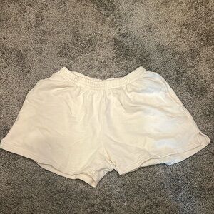 White sweat shorts from PacSun, brand is John Galt